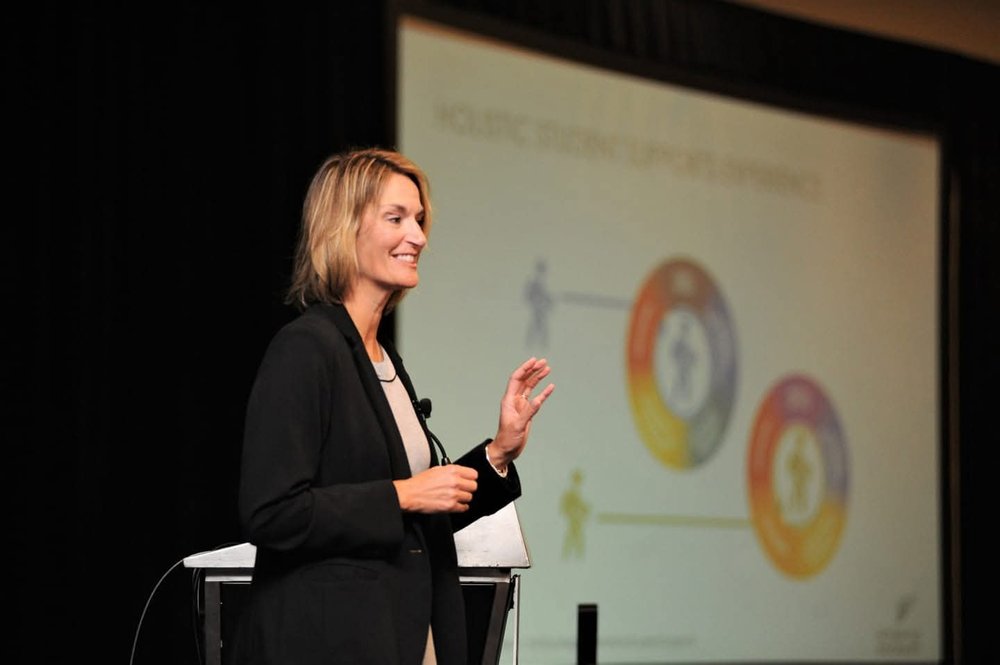 Dr. Laurie Fladd presenting on holistic student supports at a national conference